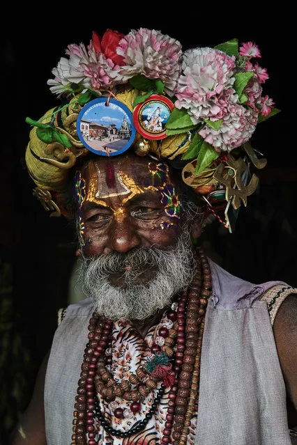 A holy man with a decorative face and headdress, taken in Kathmandu, Nepal. (Photo by Jan Moeller Hansen/Barcroft Images)