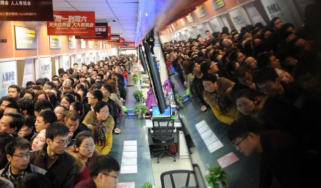 Job hunters crowd at a job fair in Taiyuan, Shanxi province, China, February 4, 2017. (Photo by Reuters/Stringer)