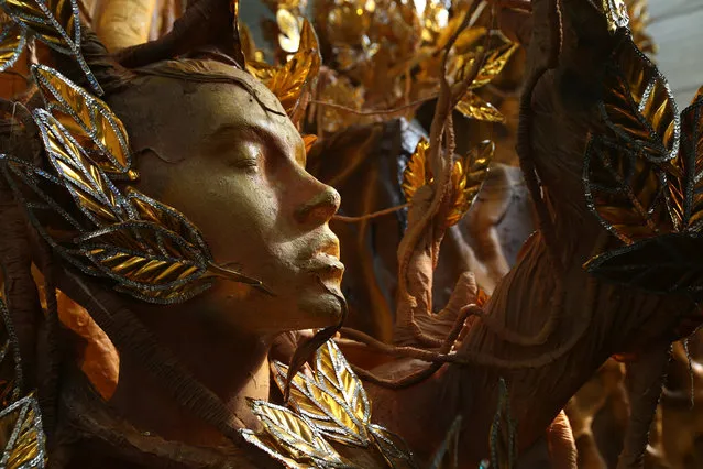 A picture made available on 10 February 2017 shows a detail of a carnival carriage of the academy of samba Portela at the workshop in the “Ciudad de la Samba” in Rio de Janeiro, Brazil, 08 February 2017. Ciudade, is a space of 93,000 square meters ceded by the city of Rio in 2005 to most important samba academies. In this workshops groups prepare their carriage for carnival parades. (Photo by Marcelo Sayao/EPA)