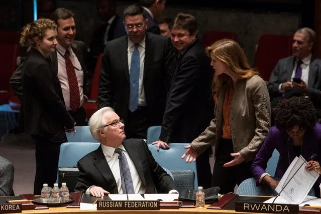 Samantha Power (R), the American ambassador to the United Nations, talks to Russia's ambassador to the United Nations Vitaly Churkin before a vote regarding the Ukrainian crisis is taken at the U.N. Security Council in New York March 15, 2014. Russian officials said Churkin died suddenly in New York City on Monday, February 20, 2017. (Photo by Andrew Kelly/Reuters)