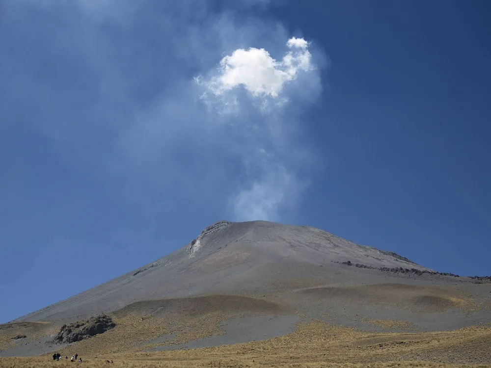 Pilgrims on the Slopes of Popocatepetl Volcano in Mexico