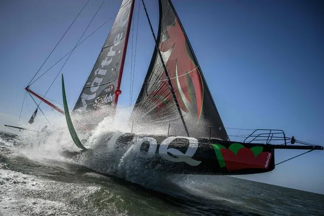 French skipper Yannick Bestaven sails his Imoca monohull Maitre Coq, off Cascais, Portugal, a few months prior to take the start of the Vendee Globe around-the-world solo sailing race, on April 9, 2024. (Photo by Loic Venance/AFP Photo)