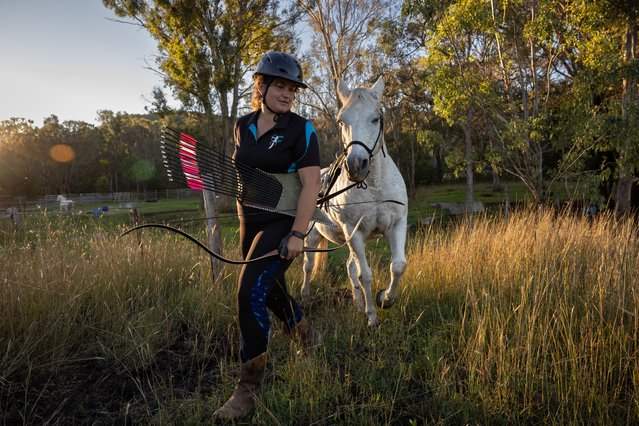 Horse archery competitor Kimberley Robertson with her horse Chiko at her home in Hirstglen, Queensland, Australia on April 9, 2024. (Photo by Aston Brown/The Guardian)