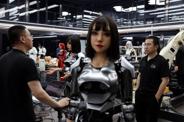 Employees work at the office of humanoid robots developer Ex-Robots in Dalian, Liaoning province, China on June 6, 2024. (Photo by Florence Lo/Reuters)