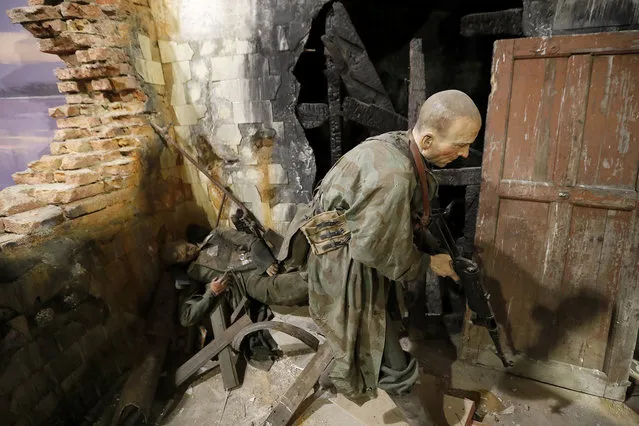 A diorama showing a scene from the “Battle of Stalingrad” during World War II is prepared for the opening of the 3D Panorama exhibition “Memory talks. The road through war” in the former Sevcabel port in St. Petersburg, Russia, 16 September 2019. (Photo by Anatoly Maltsev/EPA/EFE)