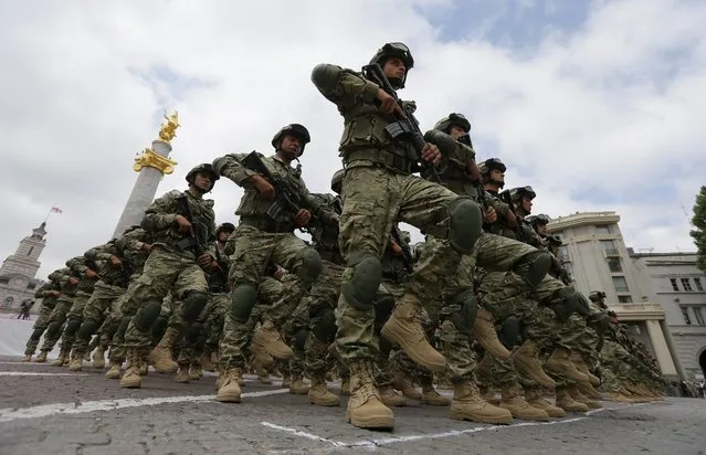 Georgian troops take part in the military parade marking the Georgian Independence Day in Tbilisi, Georgia, 26 May 2016. The Act of Independence of Georgia was adopted on 26 May 1918. (Photo by Zurab Kurtsikidze/EPA)