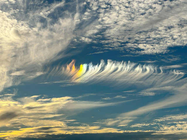 An unusual rainbow cloud at Butterfly beach in Montecito, California, US on November 27, 2023. (Photo by Amy Katz/ZUMA Press Wire/Rex Features/Shutterstock)