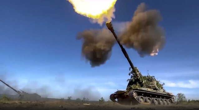 This photo taken from video released by Russian Defense Ministry Press Service on Monday, June 5, 2023 shows a Russian self-propelled gun firing towards Ukrainian positions at an undisclosed location. (Photo by Russian Defense Ministry Press Service via AP Photo)