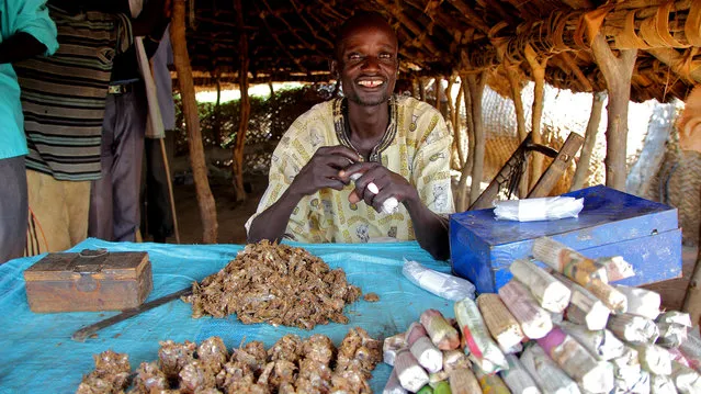 CGAP Photo Contest – Successful Business, Sudan. After joining a World Concern savings group, Marco Akot was able to open his own dried fish shop in the rural South Sudanese village of Lietnhom. After taking out a loan from the savings group, Marco was able to expand his business by hiring other fisherman and focusing on expanding his home garden. (Photo by Kelly Ranck)