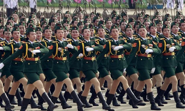 Vietnamese female commissioned officers of the signal force march during a parade marking their 70th National Day at Ba Dinh square in Hanoi, Vietnam September 2, 2015. (Photo by Reuters/Kham)