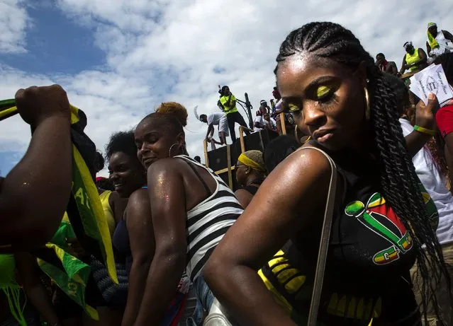 Participants dance during the West Indian Day Parade in the Brooklyn borough of New York September 1, 2014. (Photo by Eric Thayer/Reuters)