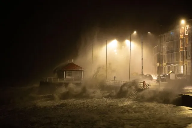 Storm Barra brings huge crashing waves along Aberystwyth, Wales, United Kingdom on December 7, 2021 seafront tonight, with an hour to go before high tide. (Photo by Ian Jones/Alamy Live News)