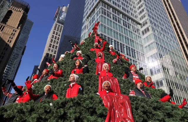 Performers sing during the 96th Macy's Thanksgiving Day Parade in Manhattan, New York City, U.S., November 24, 2022. (Photo by Andrew Kelly/Reuters)