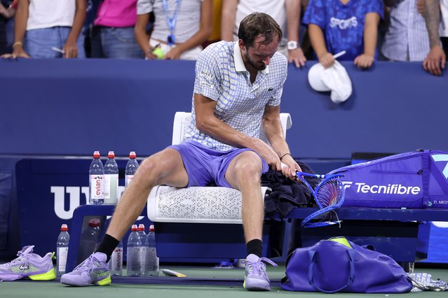 Daniil Medvedev breaks his racket after losing in five sets to Benjamin Bonzi of France during their Men's Singles First Round match on Day One of the 2025 US Open at USTA Billie Jean King National Tennis Center on August 24, 2025 in the Flushing neighborhood of the Queens borough of New York City. (Photo by Elsa/Getty Images)