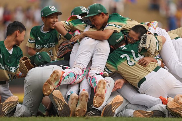 Baseball players from Taoyuan City, Taiwan, celebrate after winning the Little League World Series on Sunday, August 24, 2025. It was the first time in 29 years that a team from Taiwan has won the title. (Photo by Patrick Smith/Getty Images)