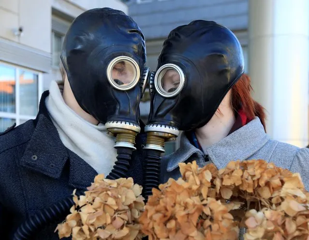 Activists from the Youth for Climate Justice movement protest during the last Valentine's Day performance against the national energy and climate plan in Ljubljana, Slovenia, February 14, 2020. (Photo by Borut Zivulovic/Reuters)