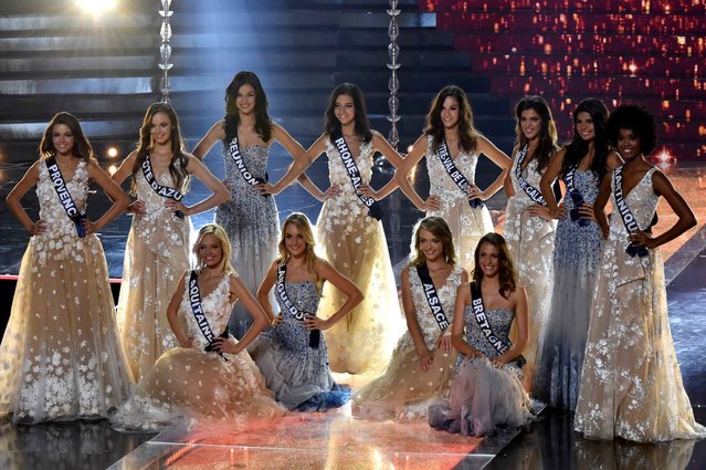 Miss France contestants stand on stage during the Miss France 2016 beauty pageant, on December 19, 2015 in Lille, northern France. (Photo by Philippe Huguen/AFP Photo)