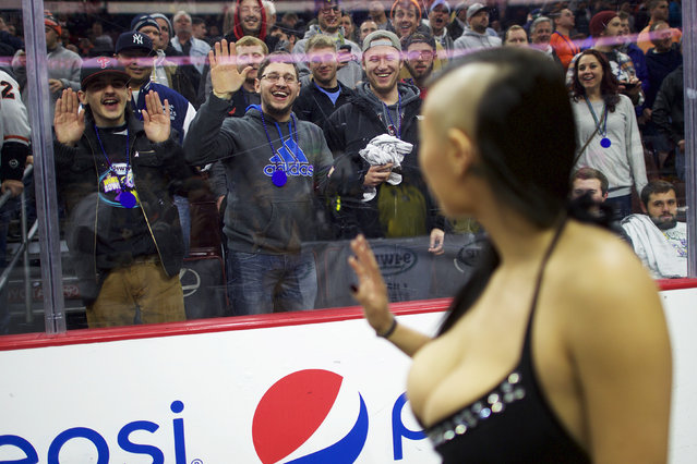 Crowds cheer during a parade before the 23rd annual Wing Bowl at the Wells Fargo Center in Philadelphia, Pennsylvania January 30, 2015. (Photo by Mark Makela/Reuters)