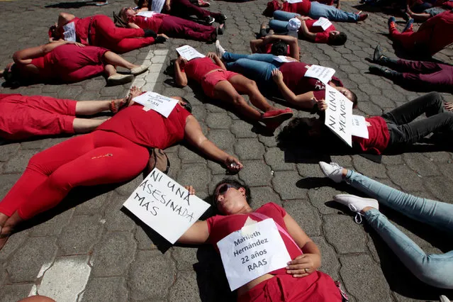 Activists block the entrance to the police headquarters building to protest the violence against women and femicides in Managua, Nicaragua November 17, 2016. (Photo by Oswaldo Rivas/Reuters)
