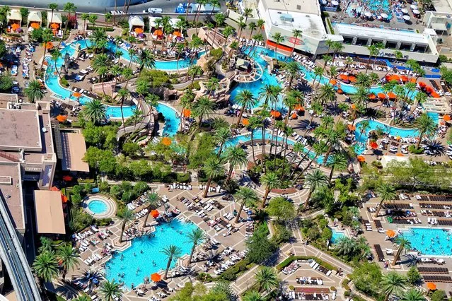World's Greatest Swimming Pools: MGM Grand, Las Vegas, Nevada. The hotel's 1,000-foot-long lazy river sits within a complex that also includes five pools and whirlpools, private cabanas and a poolside restaurant. Our top pick? Splash, the activity-centric pool that has offerings like volleyball, Jenga, beer pong and cornhole. (From $80). (Photo by MGM Resorts International)
