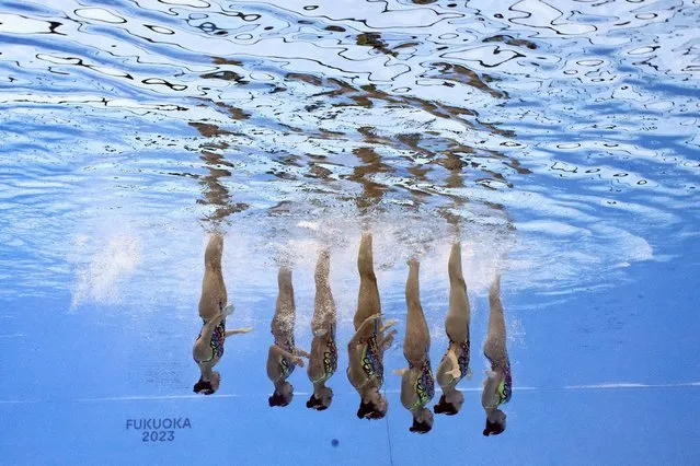 Greece team competes in the final of the women's team technical artistic swimming event during the World Aquatics Championships in Fukuoka, Japan on July 18, 2023. (Photo by Marko Djurica/Reuters)