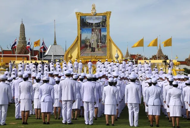 Thai caretaker Prime Minister Prayut Chan-o-cha (C) leads his cabinet and government officials in the salute to the portrait of Thai King Maha Vajiralongkorn Bodindradebayavarangkun during a ceremony for taking the oath of allegiance to become lawful civil servants, held to mark the king's 71st birthday at the royal grounds of Sanam Luang, outside the Grand Palace in Bangkok, Thailand, 28 July 2023. Thai King Maha Vajiralongkorn celebrates his 71st birthday on 28 July 2023. (Photo by Narong Sangnak/EPA)