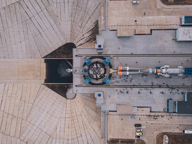 A Soyuz-2.1b carrier rocket with a Fregat upper stage and 36 OneWeb internet communication satellites is installed on a launch pad of Vostochny Cosmodrome in Amur Region, Russia on April 22, 2021; the launch is scheduled for April 26, 2021. (Photo by Roscosmos via Reuters)