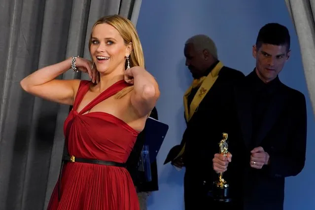 US actress Reese Witherspoon arrives in the press room at the Oscars on April 25, 2021, at Union Station in Los Angeles. (Photo by Chris Pizzello/Pool via AFP Photo)