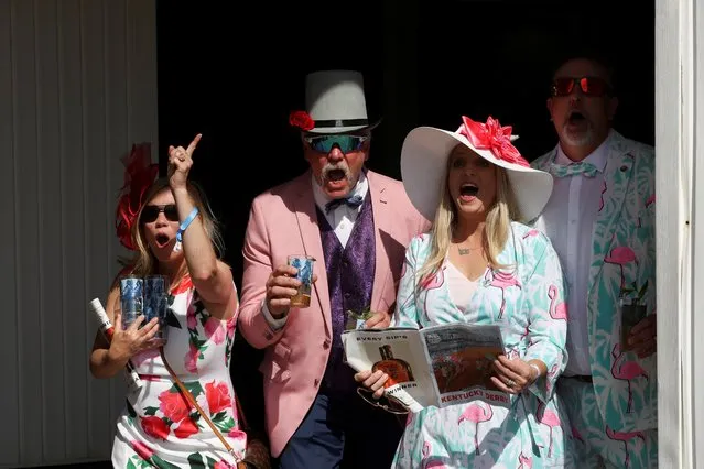 Spectators cheer for their winning horse at Churchill Downs on the day of the 147th Kentucky Derby in Louisville, Kentucky, U.S. May 1, 2021. (Photo by Amira Karaoud/Reuters)