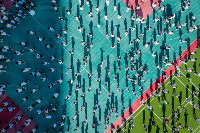 Students and teachers attend a ceremony for the new semester at a primary school in Wuhan City, central China's Hubei Province, Sept. 1, 2023. New school semester kicked off in many parts of China on Friday. (Photo by Xinhua News Agency/Rex Features/Shutterstock)