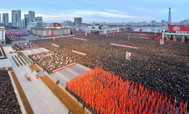 This picture taken on January 5, 2017 and released by North Korea' s official Korean Central News Agency (KCNA) on January 6, 2017 shows a mass rally taking place at Kim Il Sung Square in Pyongyang Thousands of North Koreans have rallied in Pyongyang, chanting communist slogans and vowing support for leader Kim Jong- Un, who in his New Year' s message announced plans to test- fire a ballistic missile capable of reaching the US mainland. (Photo by AFP Photo/KCNA)