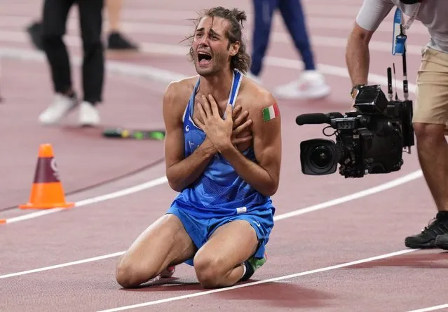 Gianmarco Tamberi of Team Italy celebrates after tying for Gold in the Men's High Jump during the Athletics competition portion of theTokyo 2020 Olympic Games Tokyo Olympic Stadium on Sunday, August 1, 2021. (Photo by Toni L. Sandys/The Washington Post)