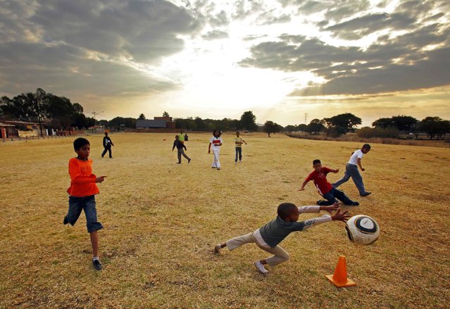 Children play soccer in the Eersterust neighborhood of Pretoria, South Africa, July 1, 2010. (Photo by Brian Snyder/Reuters)