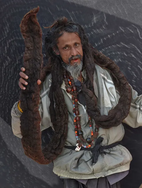 A holy man with extremely long dreadlocks, taken in Kathmandu, Nepal. (Photo by Jan Moeller Hansen/Barcroft Images)