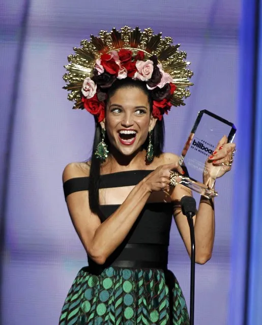 Singer Natalia Jimenez accepts an award at the 2015 Latin Billboard Awards in Coral Gables, Florida April 30, 2015. (Photo by Carlo Allegri/Reuters)