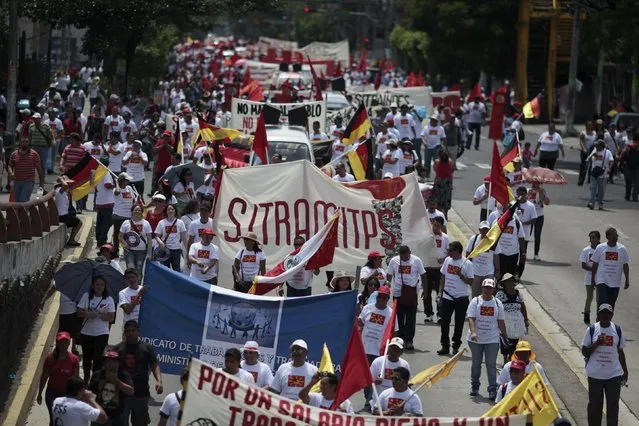 Workers march during the May Day celebration in San Salvador May 1, 2015. (Photo by Jose Cabezas/Reuters)