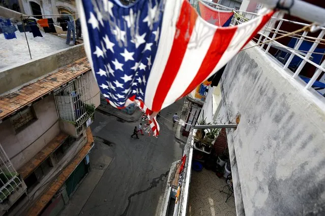 A U.S. flag is seen on a balcony in Havana, Cuba March 19, 2016. (Photo by Ivan Alvarado/Reuters)