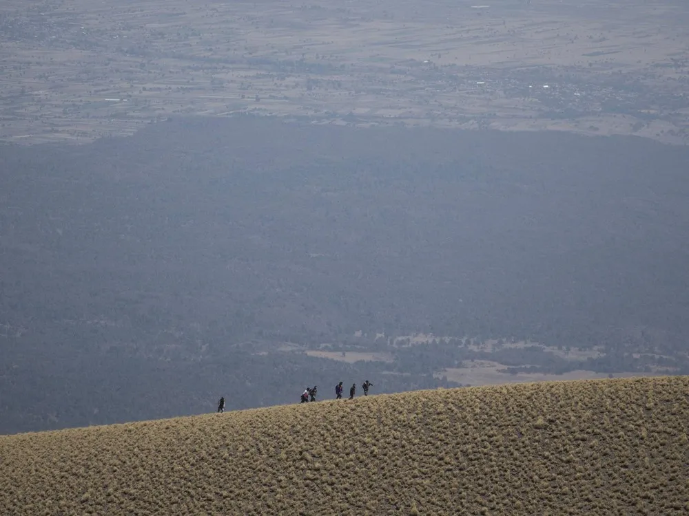 Pilgrims on the Slopes of Popocatepetl Volcano in Mexico