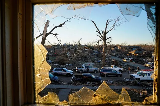 A general view from a bedroom window inside the home of the Cato family after a devastating outbreak of tornadoes ripped through several U.S. states in Mayfield, Kentucky, U.S. December 12, 2021. (Photo by Cheney Orr/Reuters)