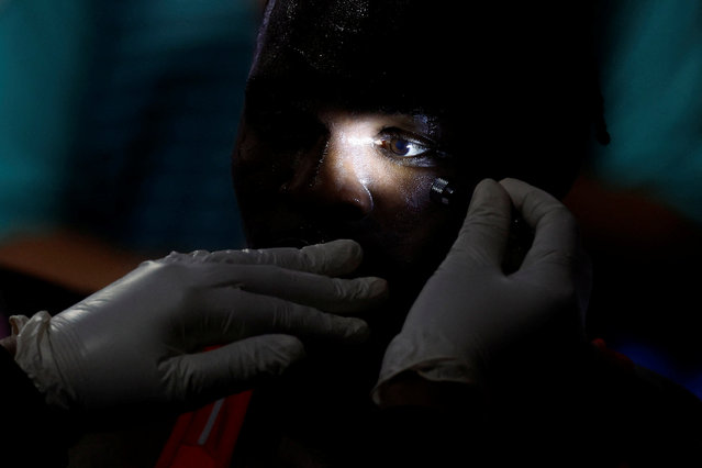 Nelvie Raman Tiafack of Germany receives medical attention after his fight against Mahammad Abdullayev of Azerbaijan in the men's boxing +92kg round of 16 on July 29, 2024. (Photo by Peter Cziborra/Reuters)