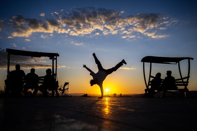 Breakdancer Furkan Coskun, who was nicknamed as “Sincap” (squirrel) at stage, performs at the Atakule to train after International Olympic Committee (IOC) approves the breakdancing as first dance sport ever to compete at the Olympic Games in Ankara, Turkiye on July 15, 2024. (Photo by Muhammed Abdullah Kurtar/Anadolu via Getty Images)