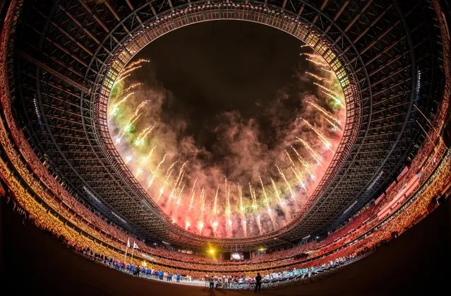 Fireworks explode during the opening ceremony of the Tokyo 2020 Paralympic Games at the Olympic Stadium on August 24, 2021 in Tokyo, Japan. (Photo by Joel Marklund/OIS/Handout via Reuters)