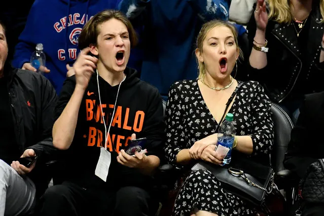 Kate Hudson and her son Ryder Robinson attend a basketball game between the Los Angeles Clippers and the Portland Trail Blazers at Staples Center on November 07, 2019 in Los Angeles, California. (Photo by Allen Berezovsky/Getty Images)