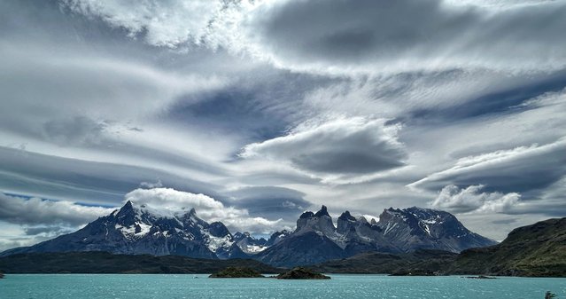 View of the Paine Massif at Torres del Paine National Park in Chile's Magallanes Region in southern Chile, 400 km northwest of Punta Arenas, on January 6, 2024. (Photo by Juan Barreto/AFP Photo)