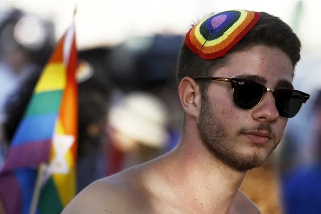A participant take part in an annual gay pride parade, before an Orthodox Jewish assailant stabbed and wounded six people, in Jerusalem on Thursday, police and witnesses said July 30, 2015. (Photo by Amir Cohen/Reuters)
