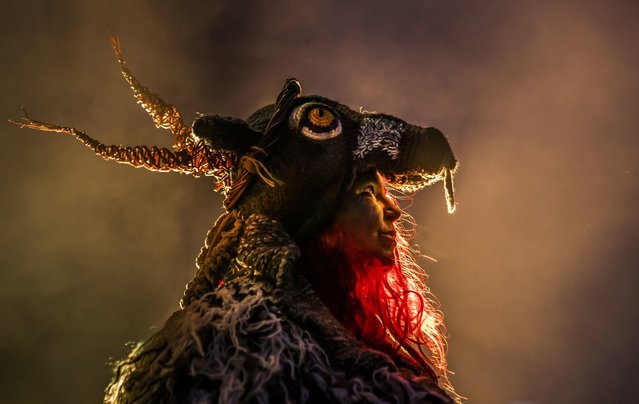 A participant during the Whitby Krampus Run street parade in Whitby, Yorkshire on Saturday, December 3, 2022, which celebrates the Krampus, a horned creature which accompanies Saint Nicholas on his rounds. (Photo by Danny Lawson/PA Images/Profimedia)