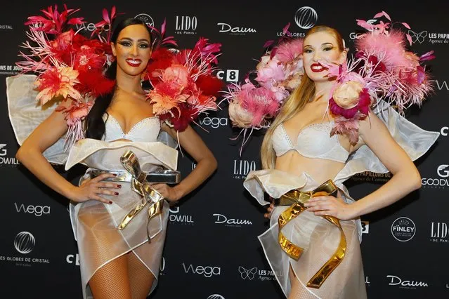 Lido dancers Alicia, left and Charlenne pose during a photo call at the Lido cabaret on the Champs-Elysees avenue to take part in the Crystal Globes awards ceremony in Paris, Monday, December 30, 2016. It’s the end of an era for the famed Lido cabaret on Paris’ Champs-Elysees. Amid financial troubles and changing times, the venue’s new corporate owner is ditching most of the Lido’s staff and its high-kicking, high-glamour dance shows. (Photo by Francois Mori/AP Photo/File)