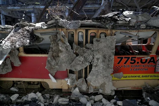 A damaged tram is pictured at a shelled tram depot in Kharkiv, amid Russia's attack on Ukraine on June 15, 2022. (Photo by Ivan Alvarado/Reuters)