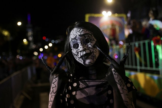 A person wearing a costume takes part in the annual NYC Halloween Parade in New York City on October 31, 2024. (Photo by Jeenah Moon/Reuters)