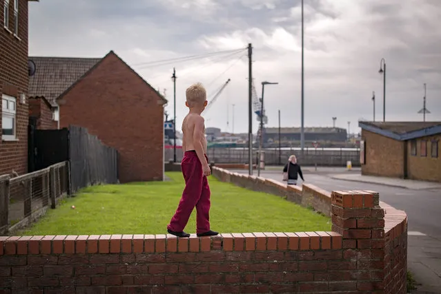 Children play on the streets of the Headlands area of Hartlepool on September 4, 2017 in Hartlepool, England. Hartlepool in the North East of England is one of the many coastal towns lagging behind inland areas with some of the worst levels of economic and social deprivation in the country. The Social Market Foundation (SMF) found that 85% of Great Britain's 98 coastal local authorities had pay levels below the national average for 2016. The government has announced that it will give 40 million GBP to encourage tourism and boost employment in the areas. (Photo by Christopher Furlong/Getty Images)